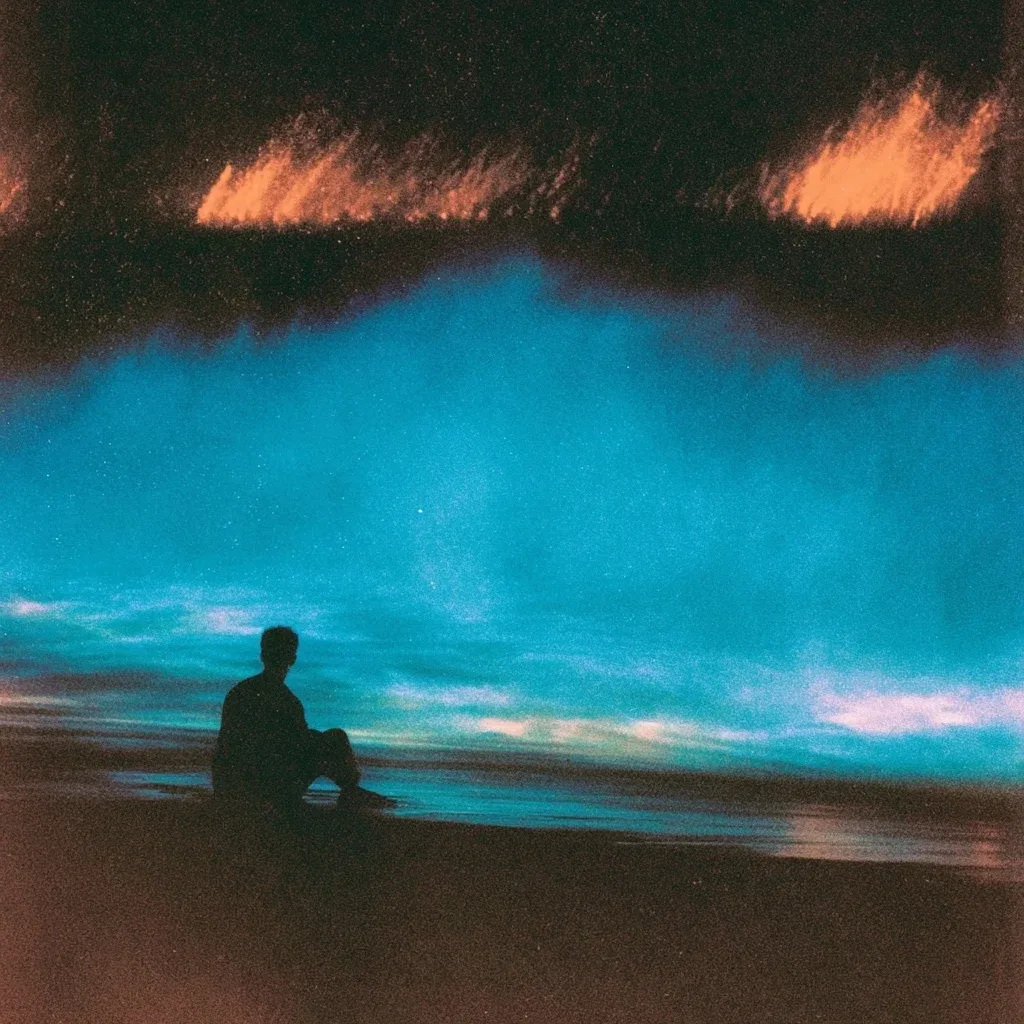 海边独坐的身影 | 蓝色海浪与橙色夜空下的复古情绪